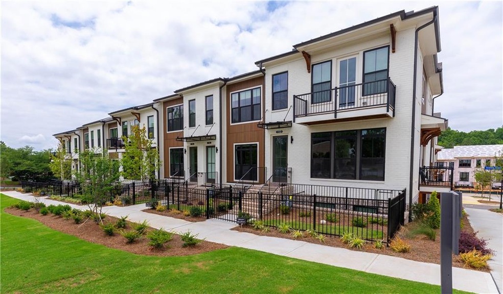 Exterior photos of a finished Brownstone building.