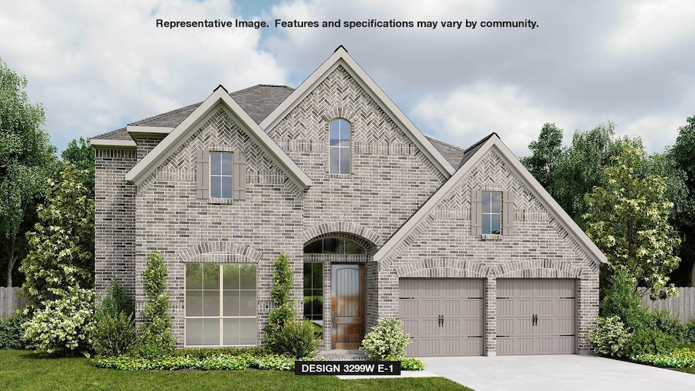 French country style house featuring brick siding
