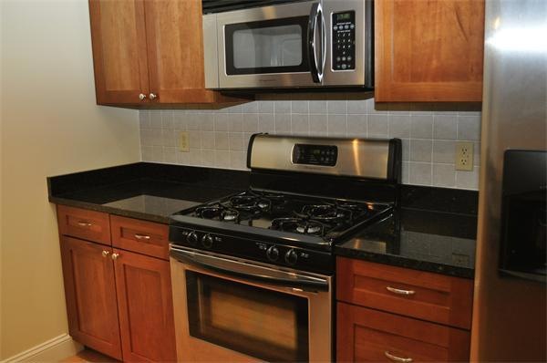 426U107 Main St unit 107, Stoneham, MA 02180 - photo 1
