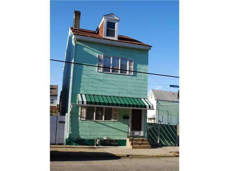 Exterior Front. Corner location