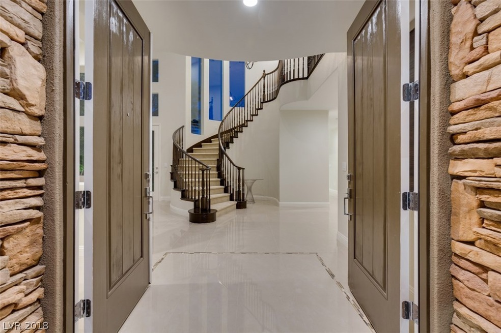 Front Entry with sweeping staircase