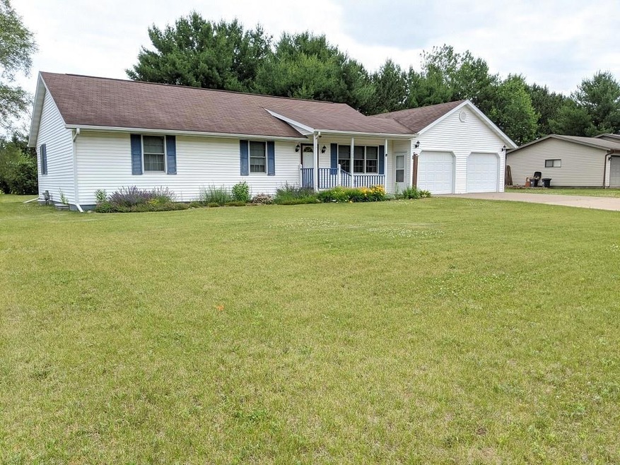 Front of house - nicely landscaped.