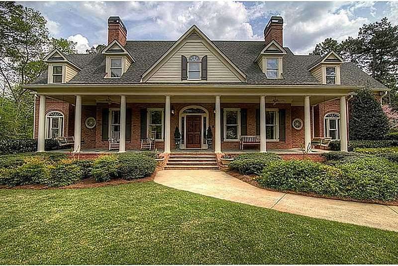 Exterior Front. With Rocking Chair Front Porch and
