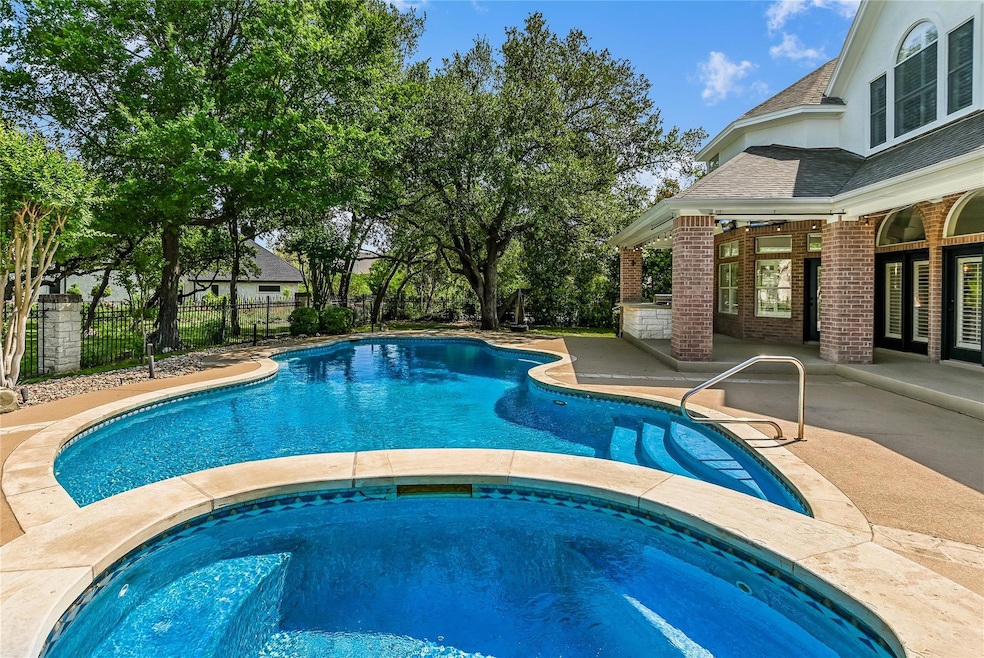 View of pool featuring fence, a patio, a fenced i