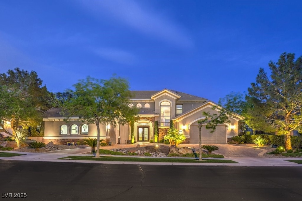 Mediterranean / spanish-style home with driveway,