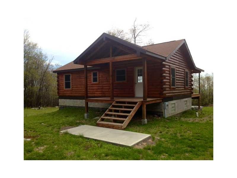 Exterior Front. Front view of Cabin from drive.