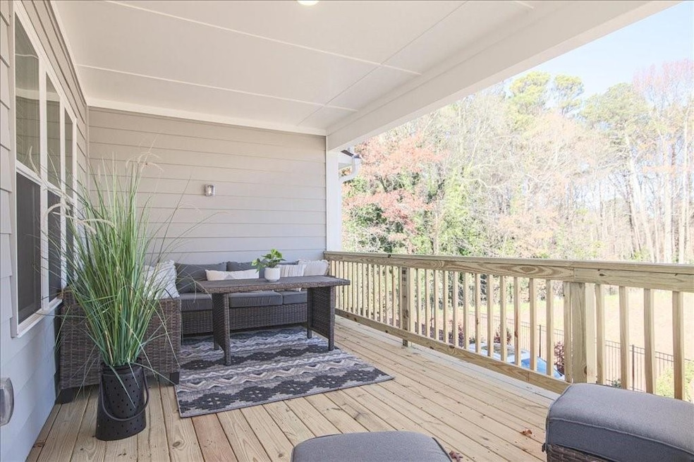 Imagine the gatherings on this large covered deck. It's ready to mount your big screen TV and watch sports while hosting your friends at your new home.