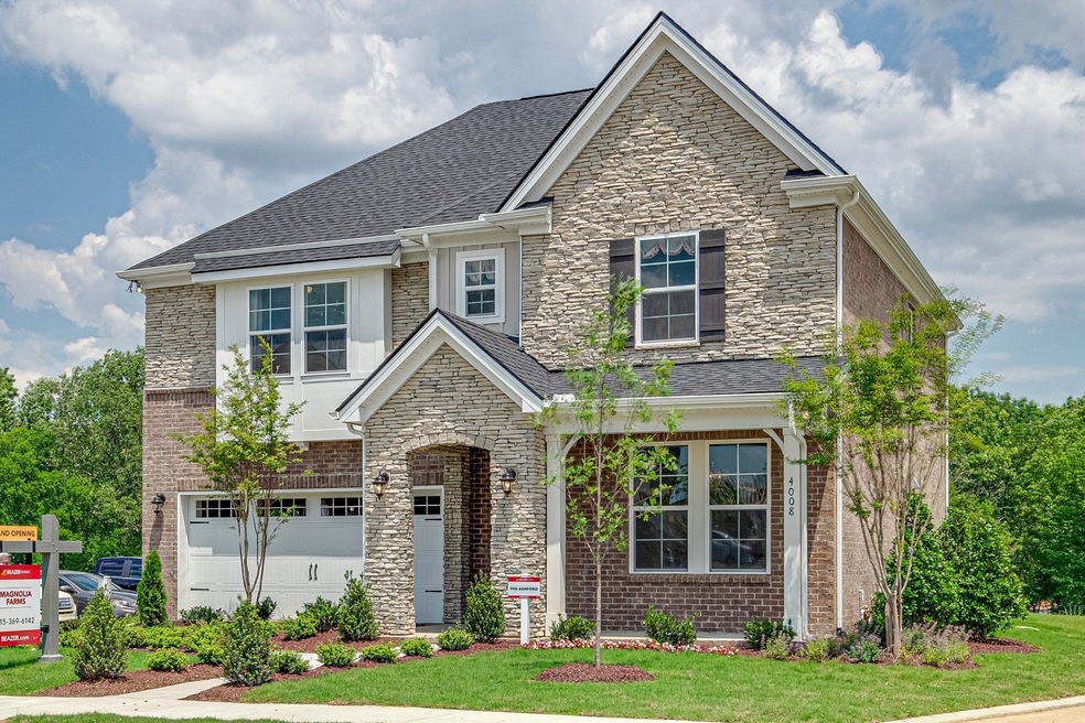 All photos are of an Ashford plan model home in one of our other communities.  Buyers to select design features. 