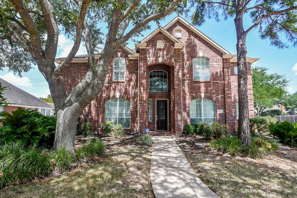 8923 Apple Mill Dr, Houston, TX 77095 - photo 1