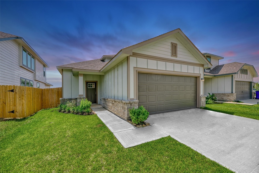 Welcome to this charming, new residence nestled in Granger Pines. With 4 bedrooms and 3 baths, this home welcomes you with an inviting exterior featuring a charming facade that blends stone and durable cement board. A double-wide driveway leads to a convenient 2-car garage ensuring easy access.