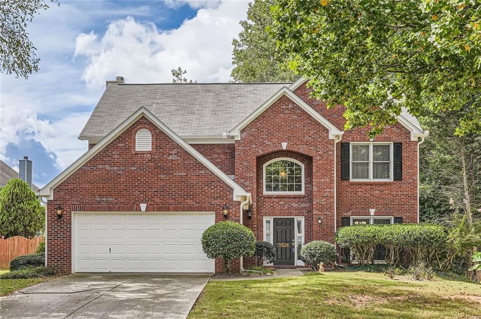 View of front of property featuring a front yard