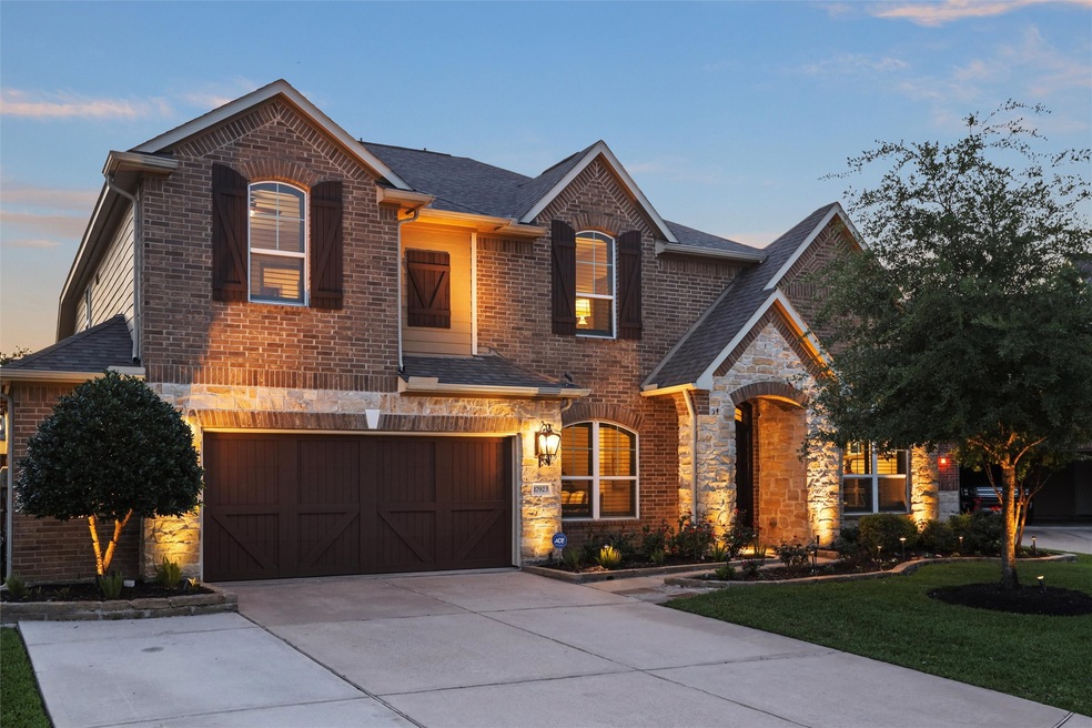 Well cared for home with enhanced brick and stone elevation and up-lighting.