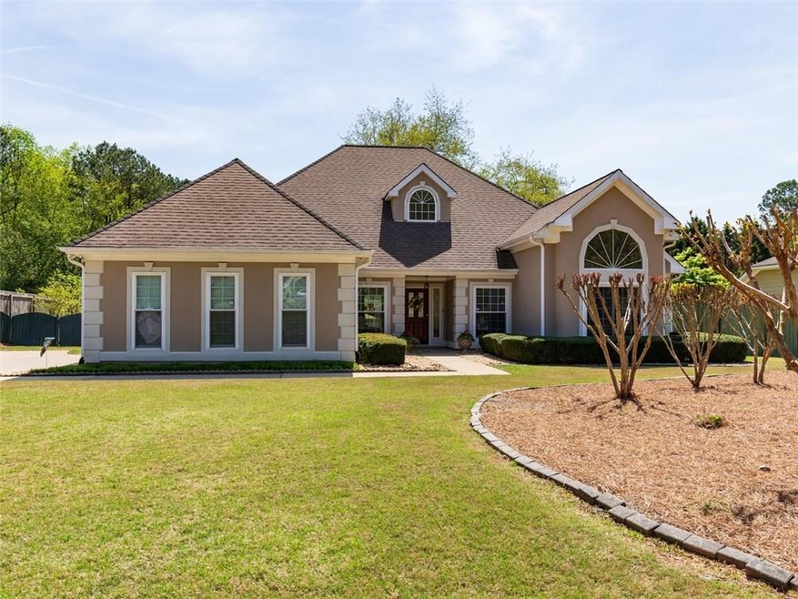 Well maintained Ranch home is located on a beautif