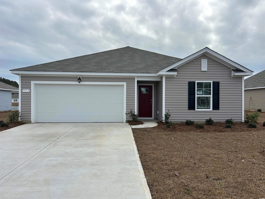Single story home with a garage