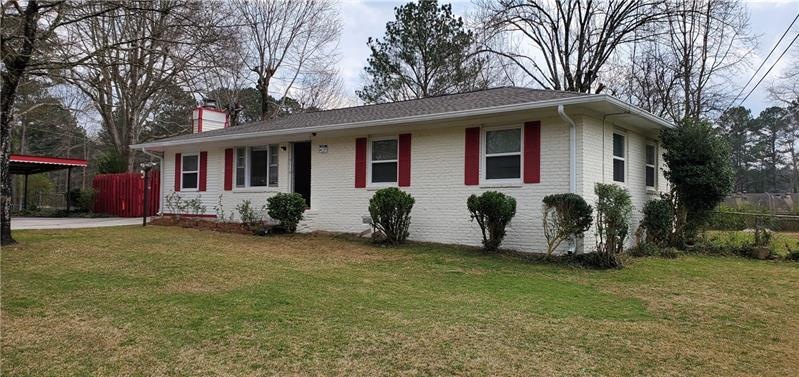 Beautiful 4 side brick ranch painted outside and i
