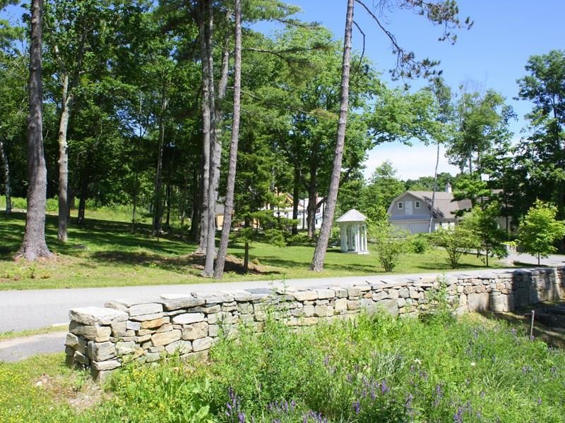 Lovely stonewall along the front the...