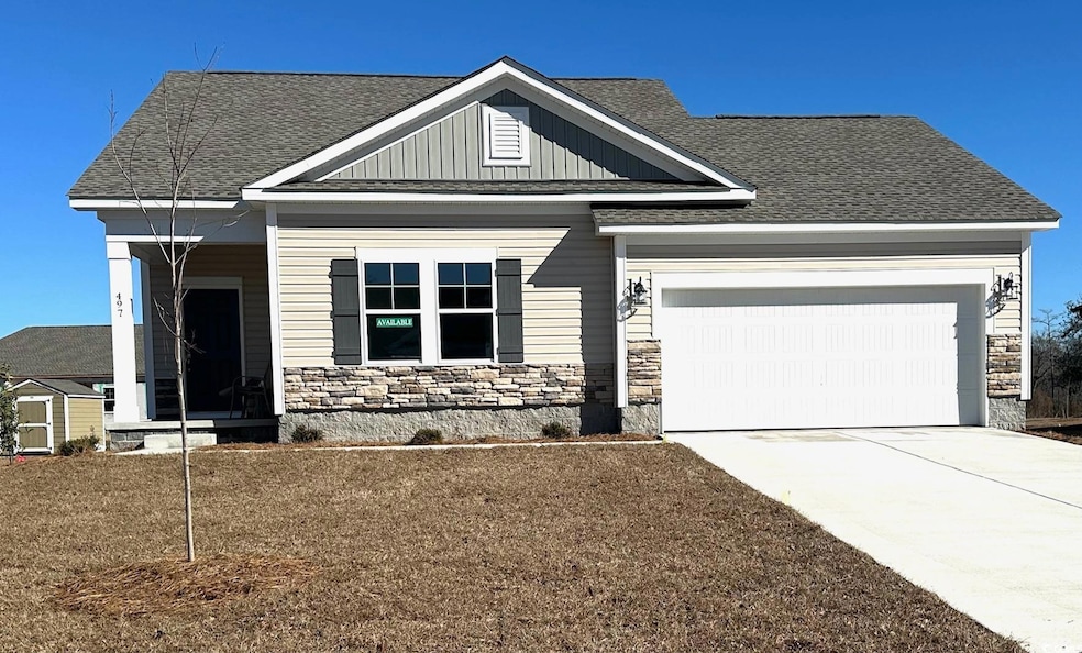 View of front of home featuring a front lawn and a