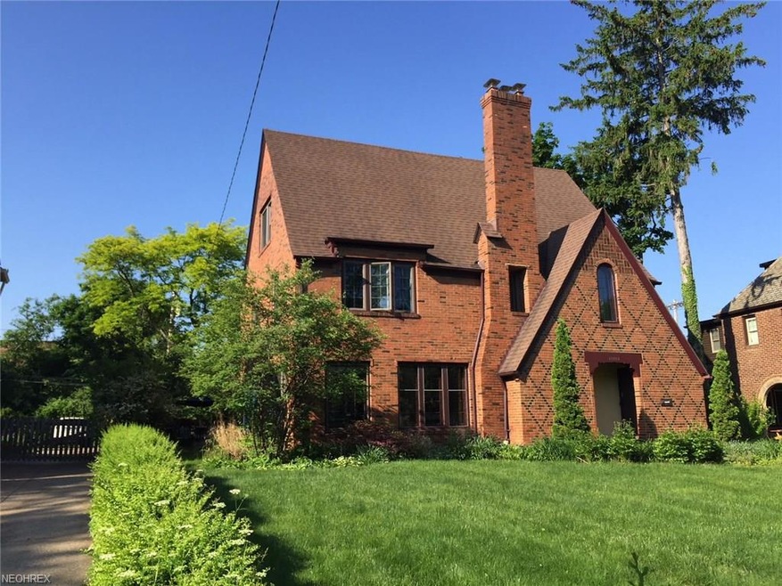 Lovely tapestry brick home surrounded by establish