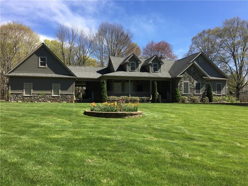 COUNTRY LIVING AT IT'S FINEST!  THIS SPRAWLING RAN