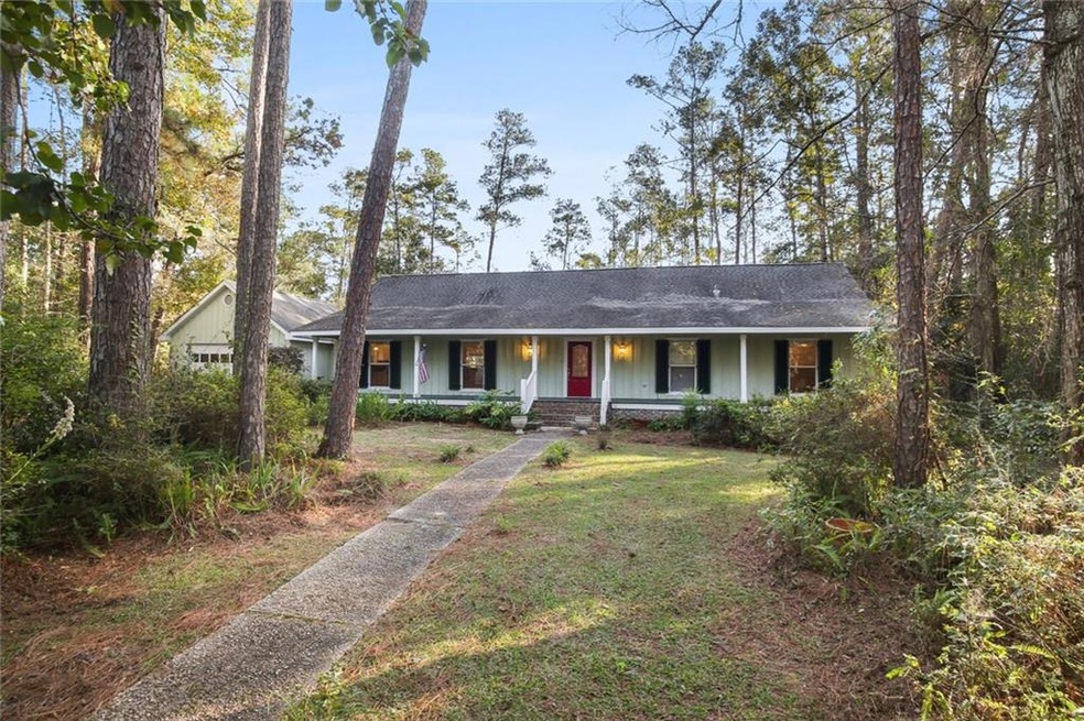 Classic Acadian cottage on approx 1 acre of land,