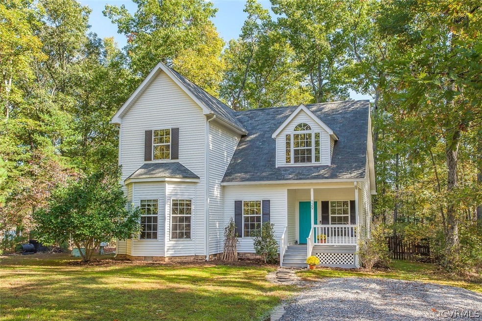 Welcome to 129 American Drive! Very private on two wooded lots with frontage on Lake Ladysmith!