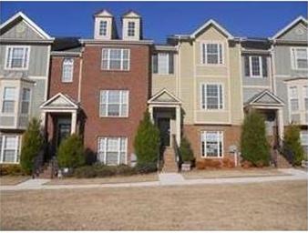 Exterior Front. EXECUTIVE TOWNHOUSE LIVING AT ITS 