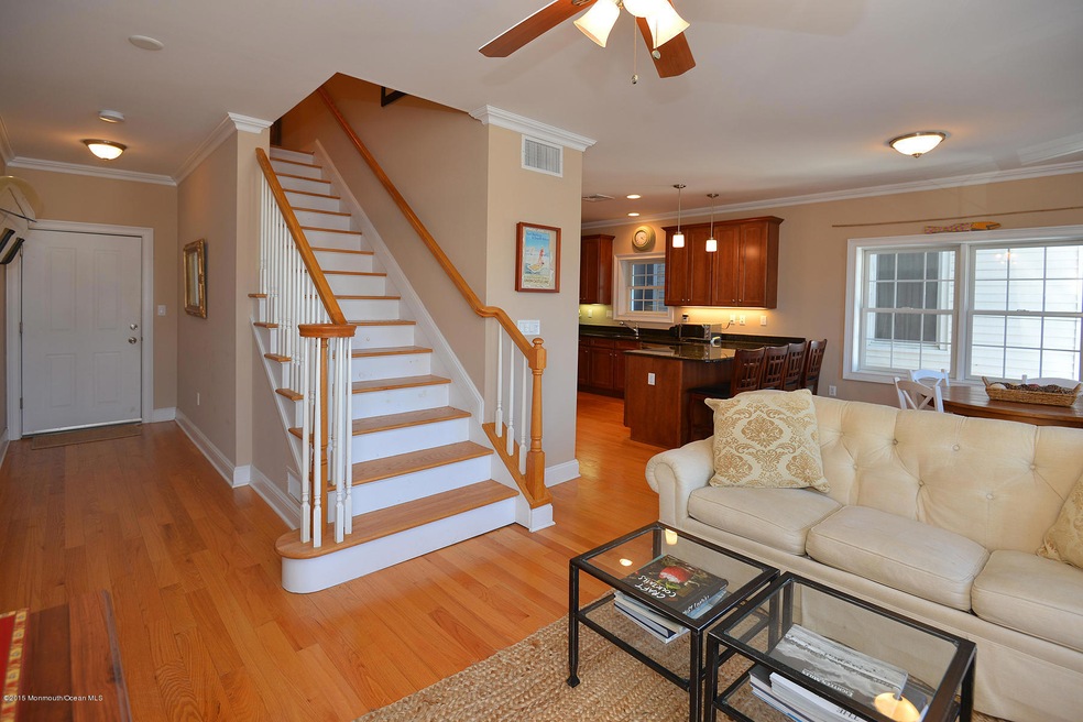 Living Room With View of Kitchen