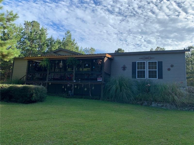 Front of home with a wonderful relaxing front porc