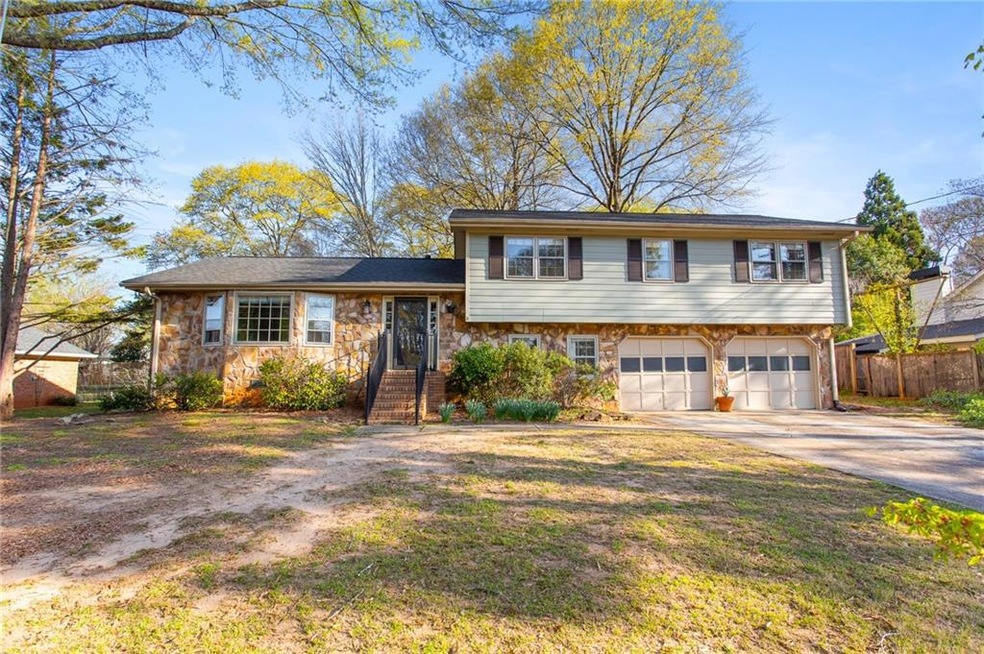 Split level home featuring a garage