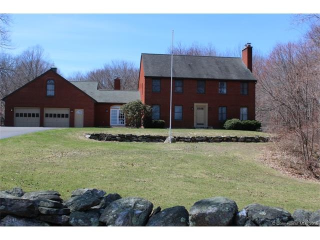 Stately 10 room brick colonial has 5 bedrooms & 3 