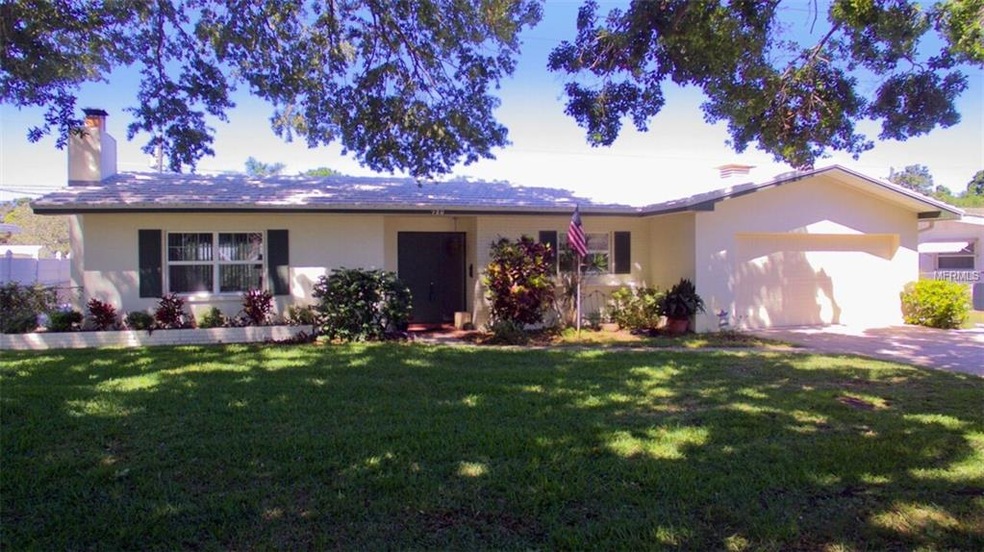 House has oak trees creating tons of shade from th