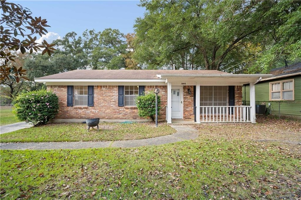 Ranch-style home with cooling unit, covered porch,