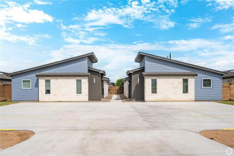 Back of property with a patio area