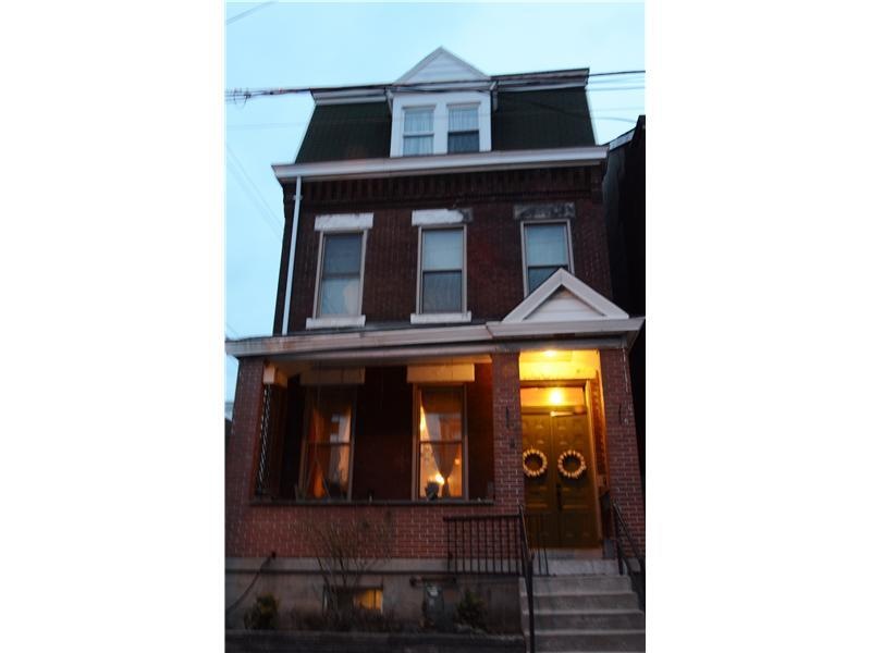 Exterior Front. This Three Story Brick Victorian o