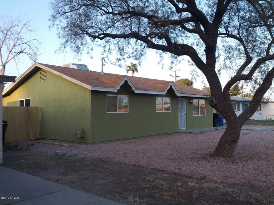 Front- New Stucco & Windows