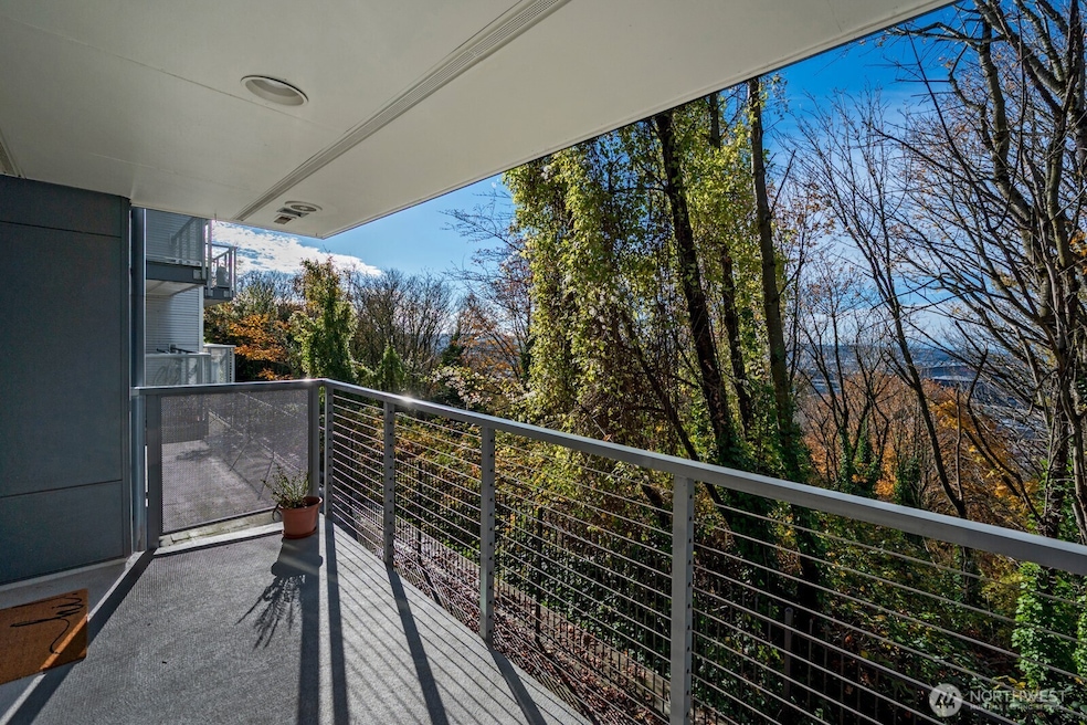 Above a natural valley, the deck offers privacy & views.