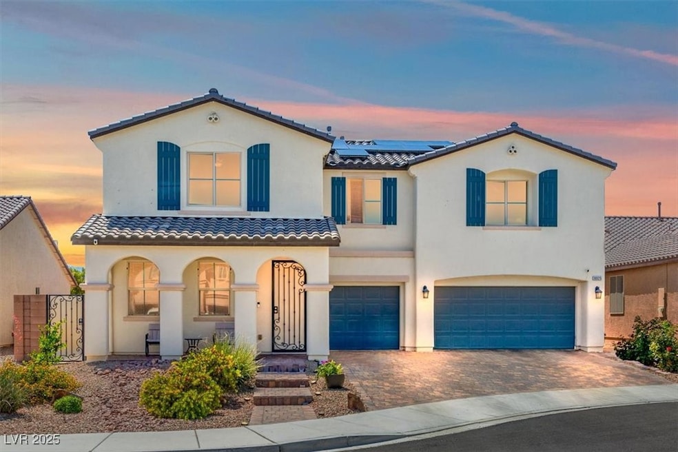 Mediterranean / spanish house featuring a garage,