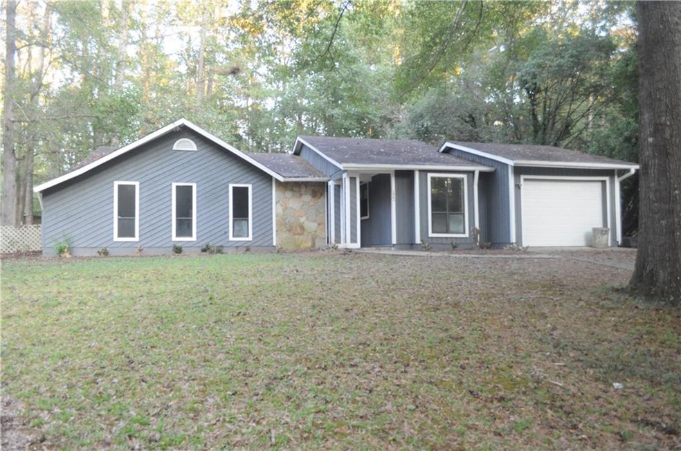 Freshly painted exterior. Very large lot!
