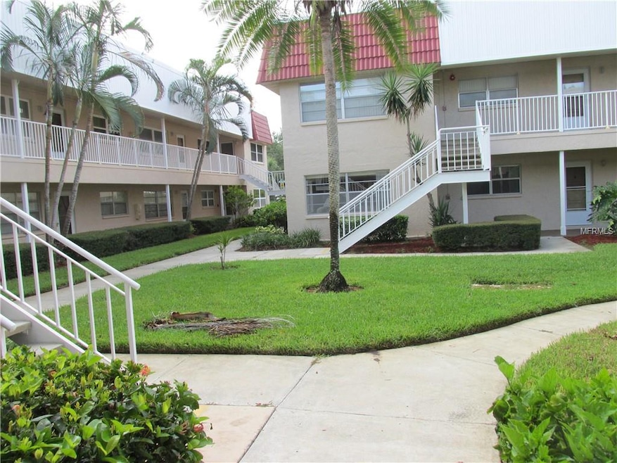 FIRST FLOOR CORNER UNIT. INCLUDED IN THE SALE IS A