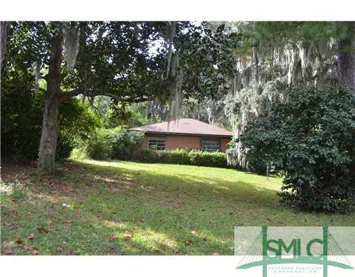Exterior Front. Front yard overlooks Marsh and Cre