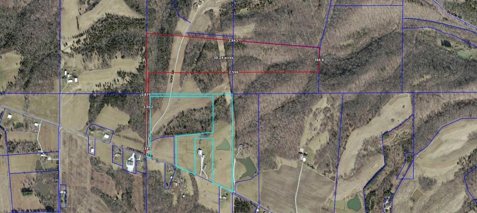 Aerial map showing the property outlined in Red. E