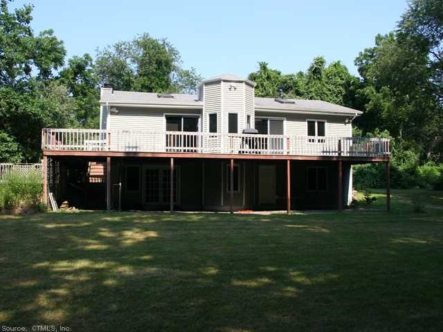 Exterior Front. Unique contemporary raised ranch w