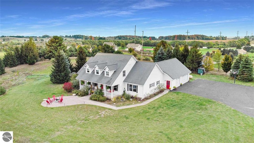 7868 E Longbranch Cir, Traverse City, MI 49684 - photo 1