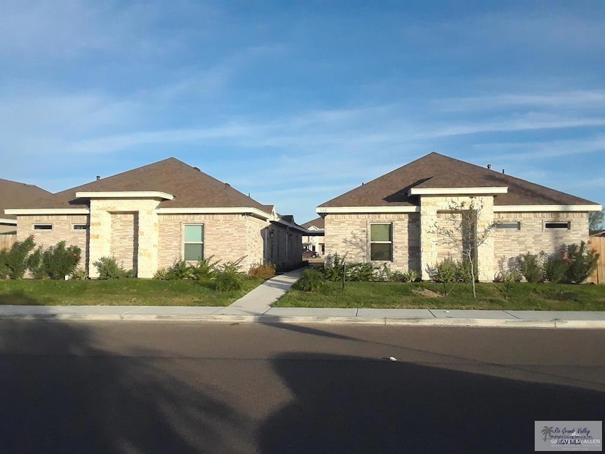 View of front facade featuring stone siding
