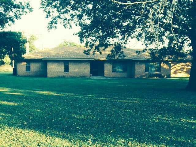 Exterior Front. Lovely brick 3 bd,3 ba on large co