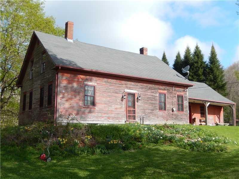 Exterior Front. Proud antique homestead.