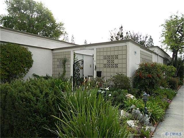 Beautiful garden setting welcomes you home.  Doubl