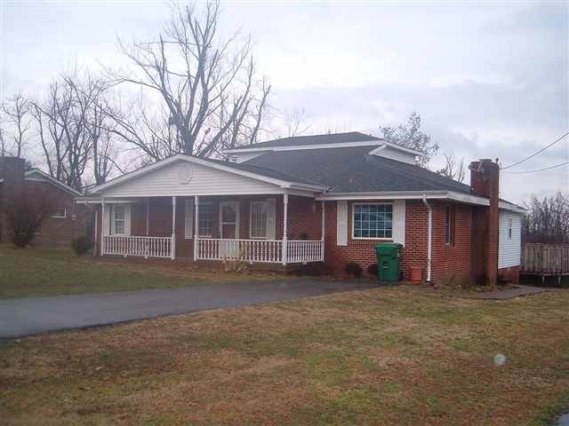 Front view of house, looking from SE to NW