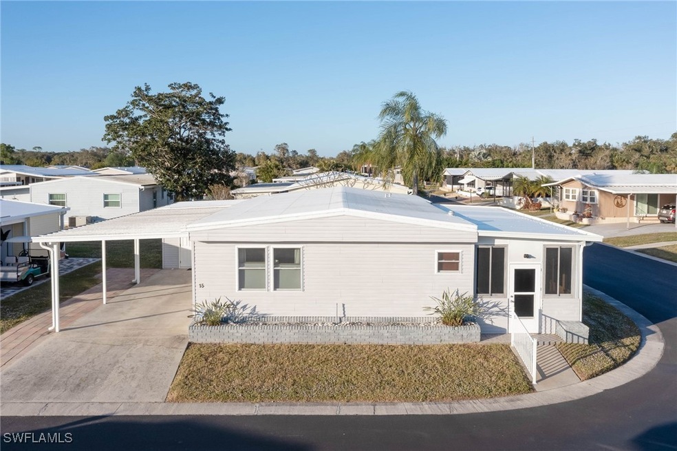 View of front facade featuring a carport
