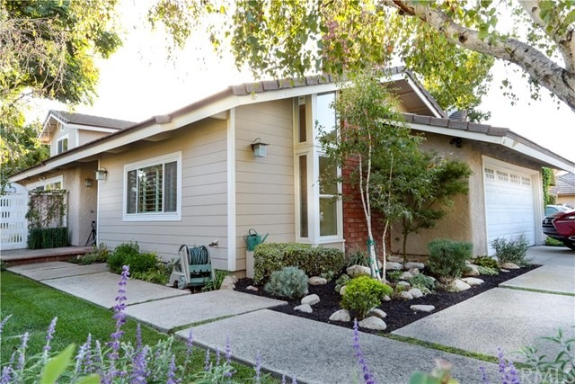 Front & partial side view of home. Beautiful hards